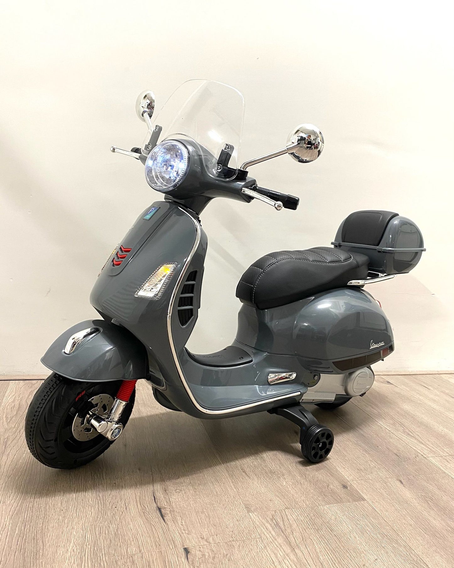 Kinder vespa grijs